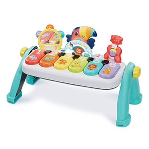 Kleurrijke kinderpiano met toetsen en een toekan