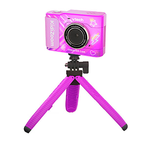 Roze kindercamera op een tripod